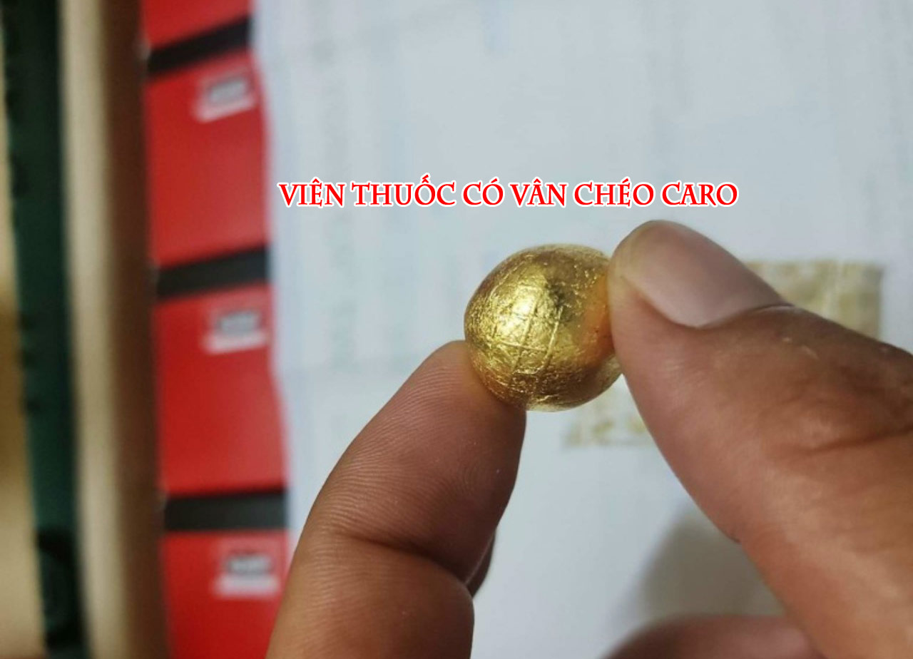 Đặc điểm đường vân caro khi bóc viên thuốc nhìn bằng mắt thường của An cung ngưu hoàng hoàng kwangdong chuẩn Đặc điểm đường vân caro khi bóc viên thuốc nhìn bằng mắt thường của An cung ngưu hoàng hoàng kwangdong chuẩn